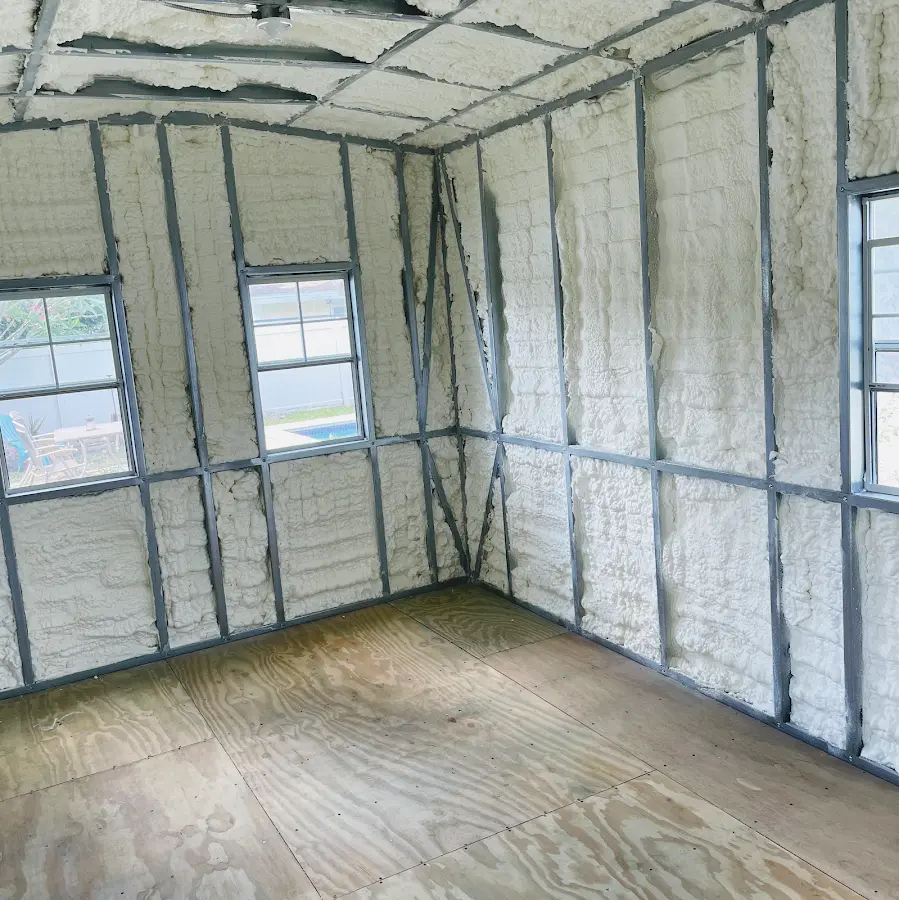 Closed-cell spray foam insulation applied to wall cavities in a residential project in Castle Pines Village